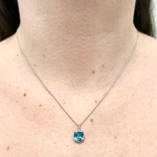 14 Karat White Gold Cushion Swiss Blue Topaz & Diamond Pendant Necklace - WeilJewelry