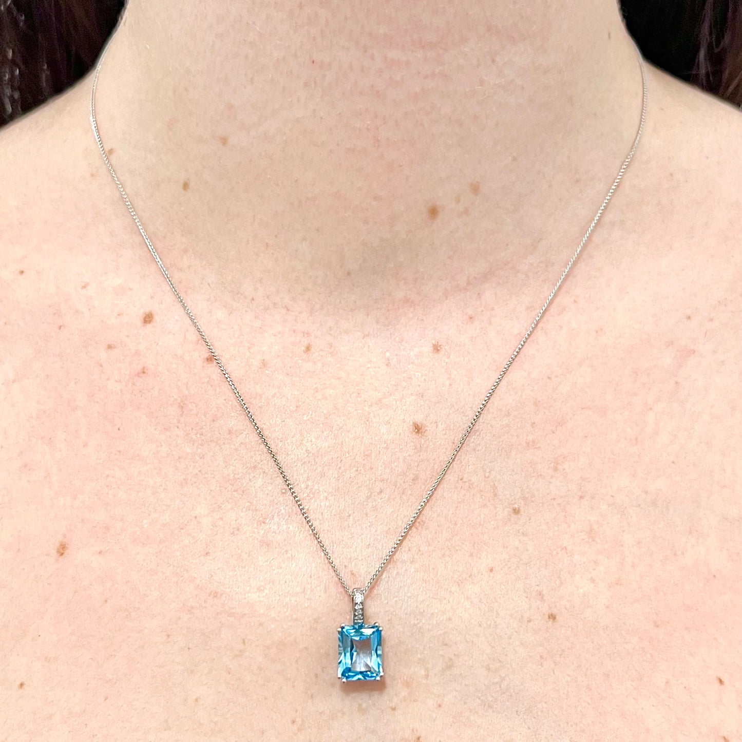 14 Karat White Gold Radiant Swiss Blue Topaz & Diamond Pendant Necklace