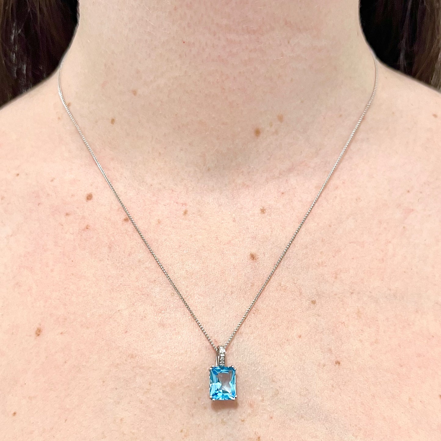 14 Karat White Gold Radiant Swiss Blue Topaz & Diamond Pendant Necklace