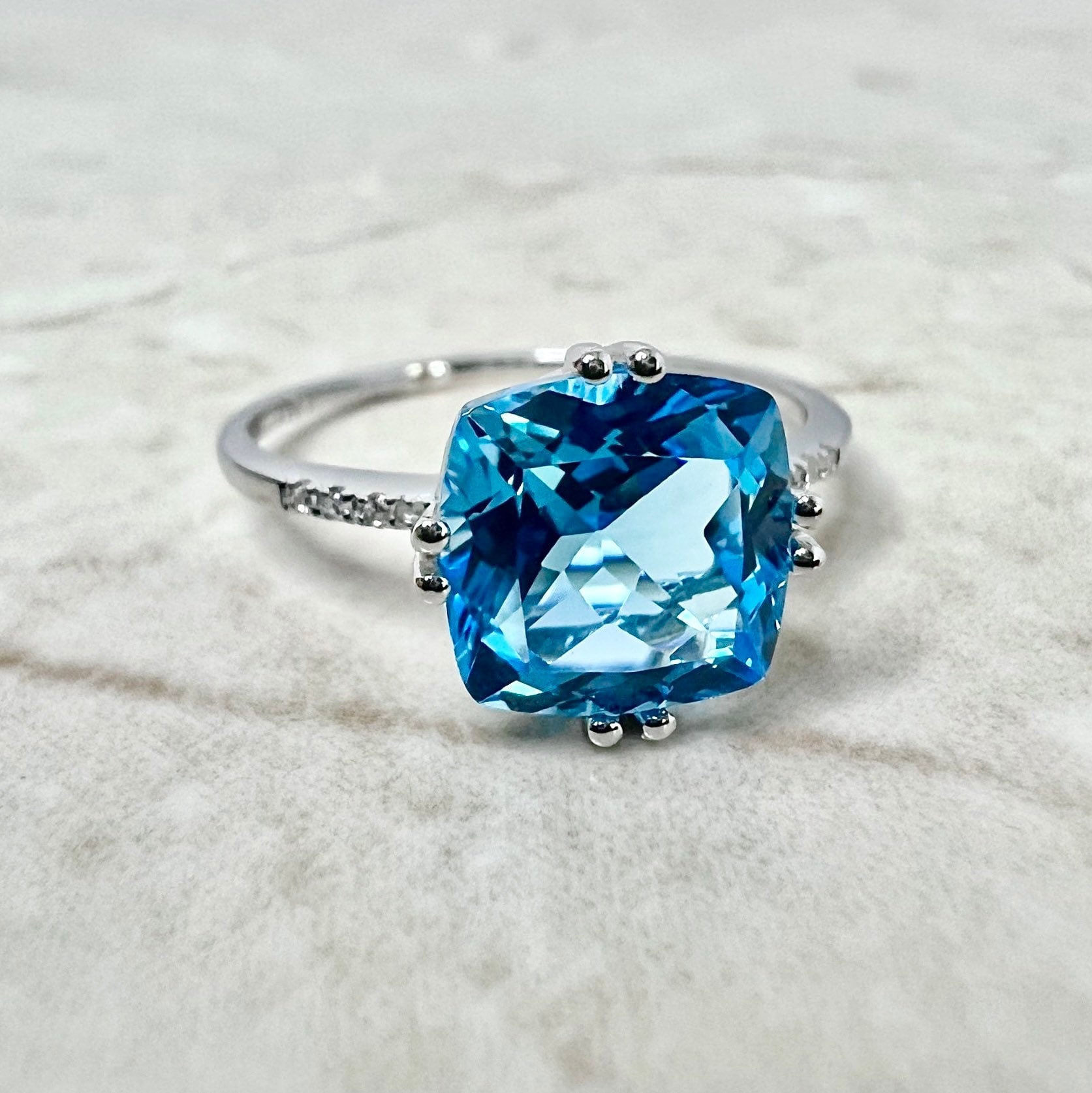 14 Karat White Gold Cushion Cut Swiss Blue Topaz Diamond Ring