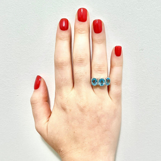 14 Karat White Gold Oval Swiss Blue Topaz & Diamond Three - Stone Ring - WeilJewelry