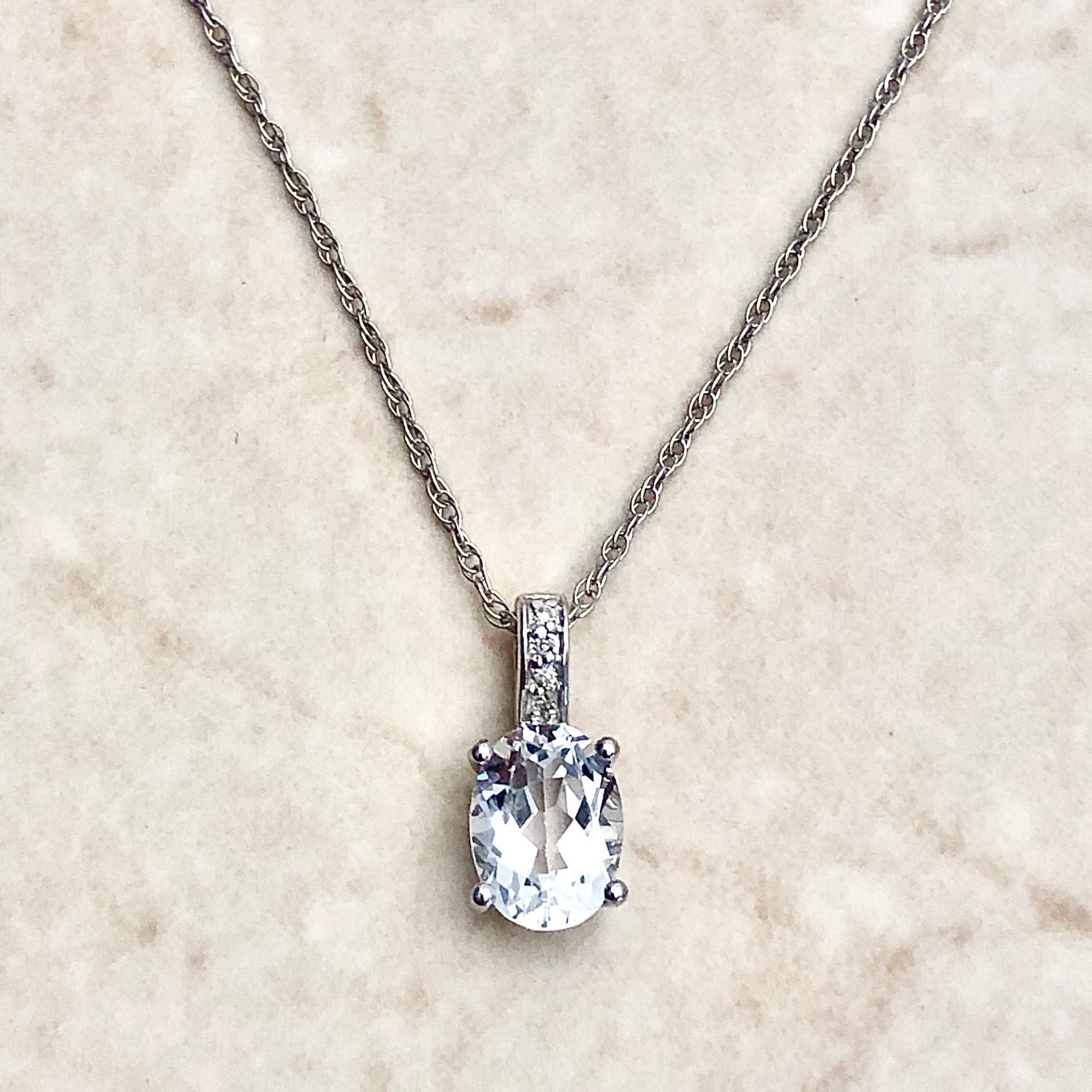 14 Karat White Gold April Birthstone Oval White Topaz & Diamond Pendant Necklace - WeilJewelry