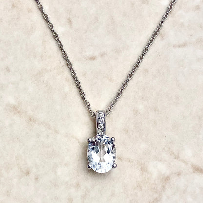 14 Karat White Gold April Birthstone Oval White Topaz & Diamond Pendant Necklace - WeilJewelry