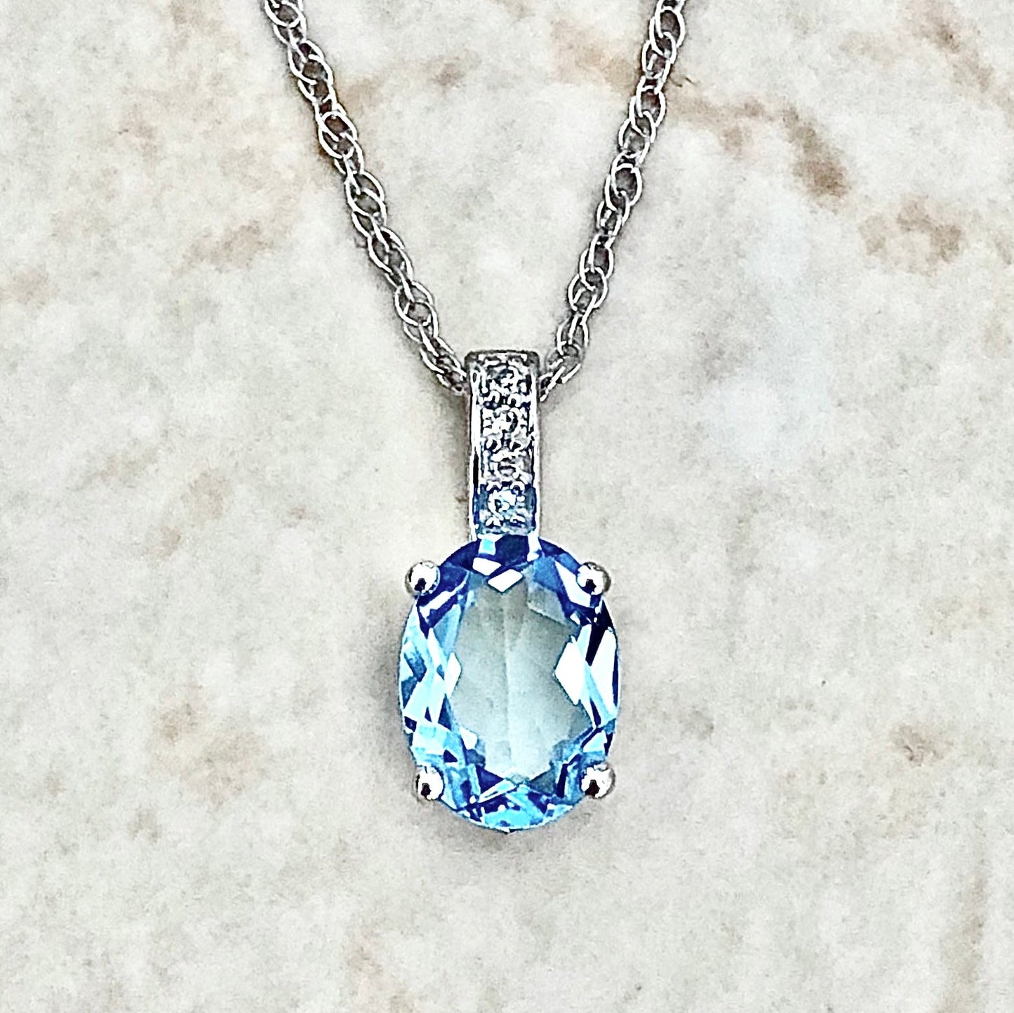 14 Karat White Gold December Birthstone Oval Blue Topaz & Diamond Pendant Necklace - WeilJewelry