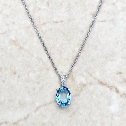 14 Karat White Gold December Birthstone Oval Blue Topaz & Diamond Pendant Necklace - WeilJewelry