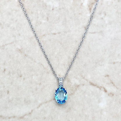 14 Karat White Gold December Birthstone Oval Blue Topaz & Diamond Pendant Necklace - WeilJewelry