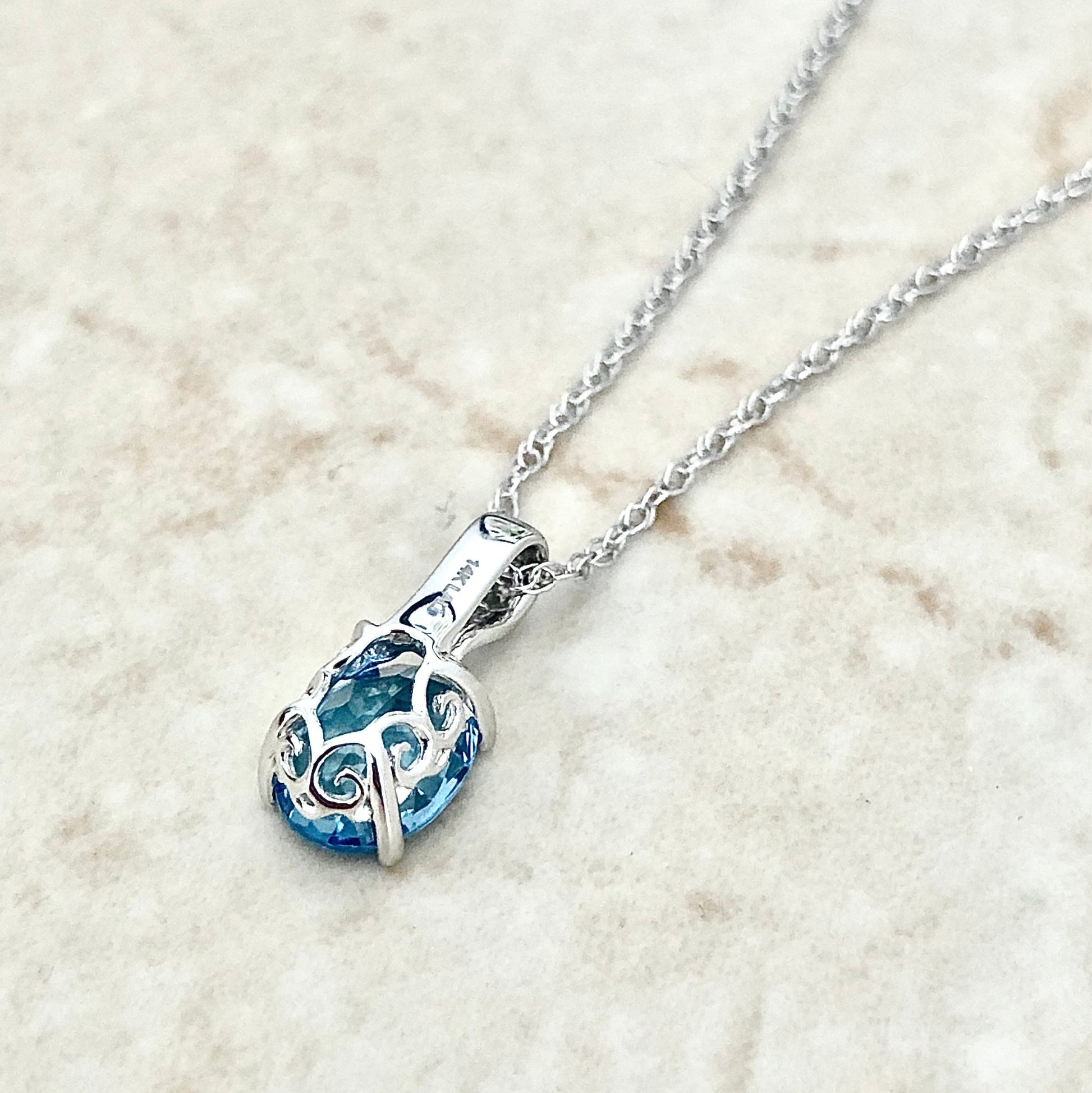 14 Karat White Gold December Birthstone Oval Blue Topaz & Diamond Pendant Necklace - WeilJewelry