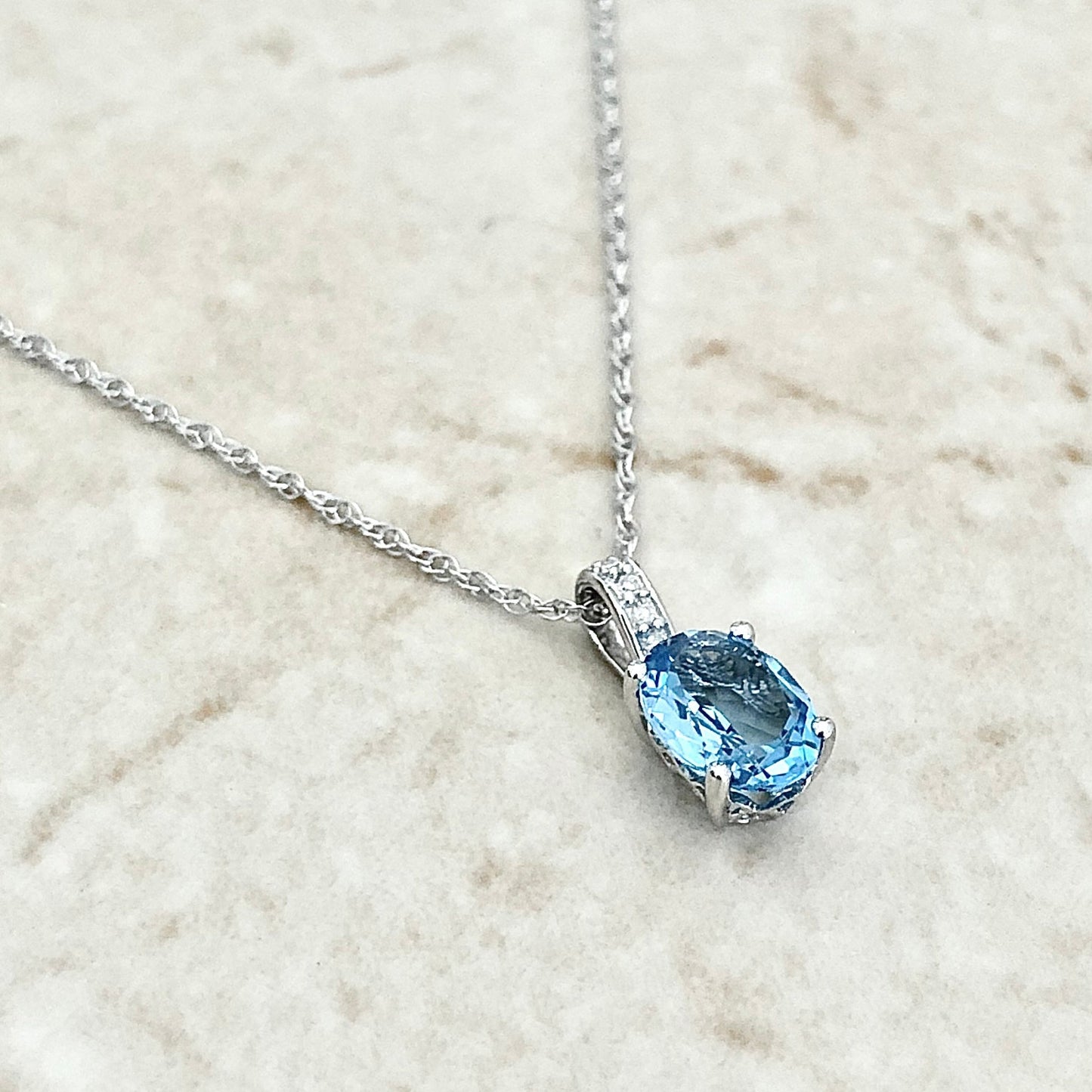 14 Karat White Gold December Birthstone Oval Blue Topaz & Diamond Pendant Necklace - WeilJewelry