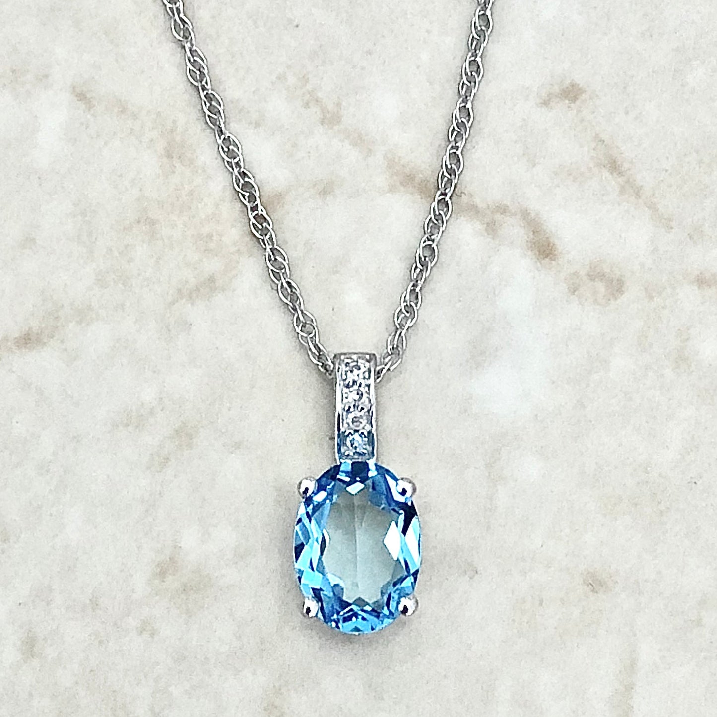 14 Karat White Gold December Birthstone Oval Blue Topaz & Diamond Pendant Necklace - WeilJewelry