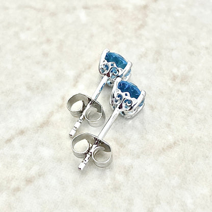 14 Karat White Gold December Birthstone Oval Blue Topaz Stud Earrings - WeilJewelry