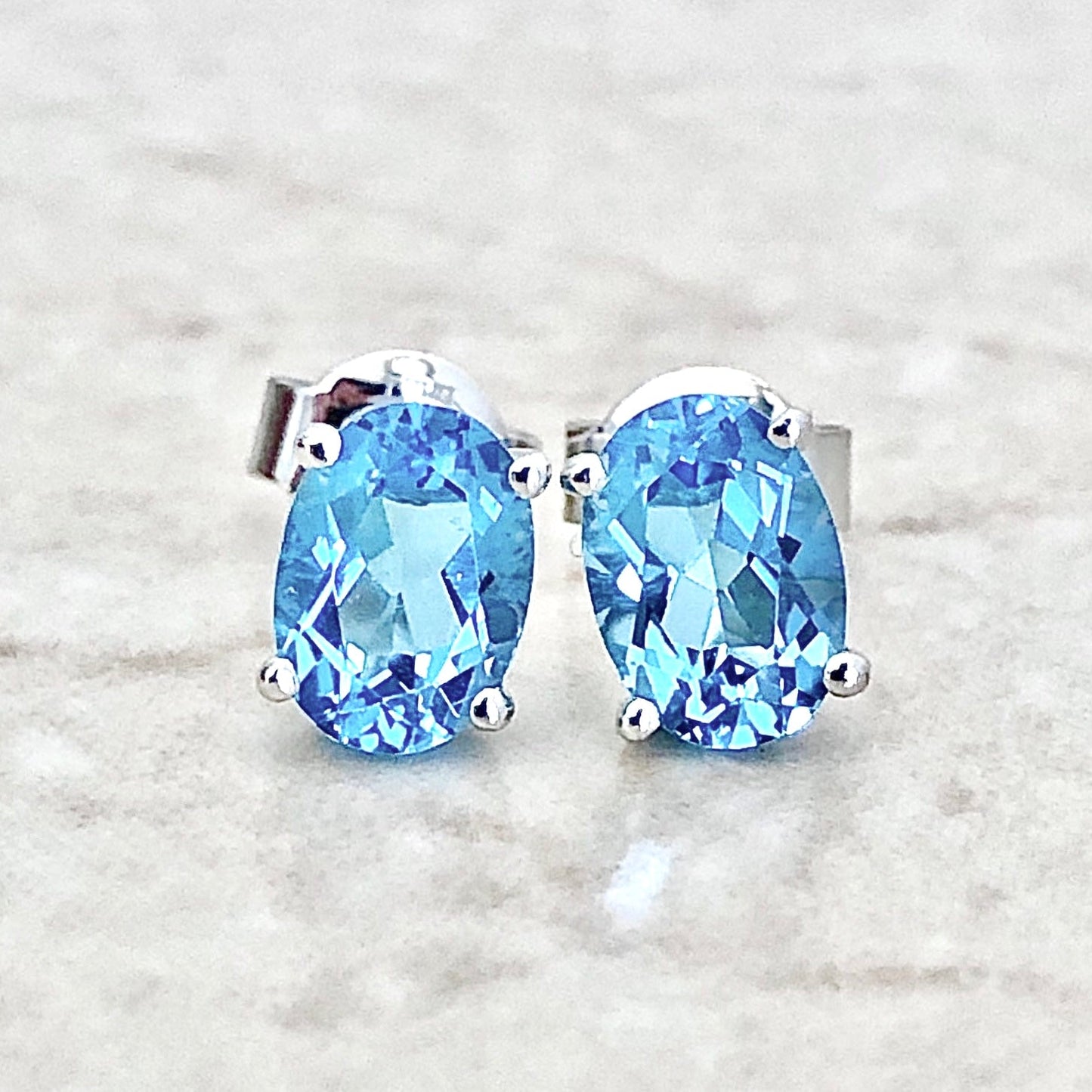 14 Karat White Gold December Birthstone Oval Blue Topaz Stud Earrings - WeilJewelry