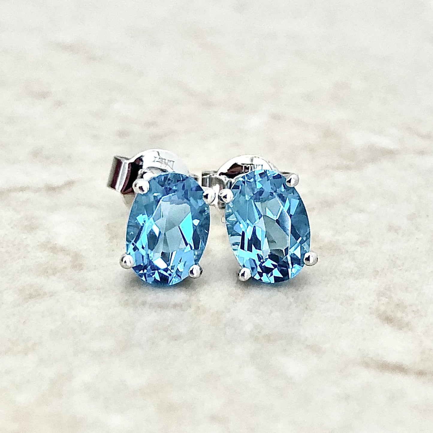 14 Karat White Gold December Birthstone Oval Blue Topaz Stud Earrings - WeilJewelry