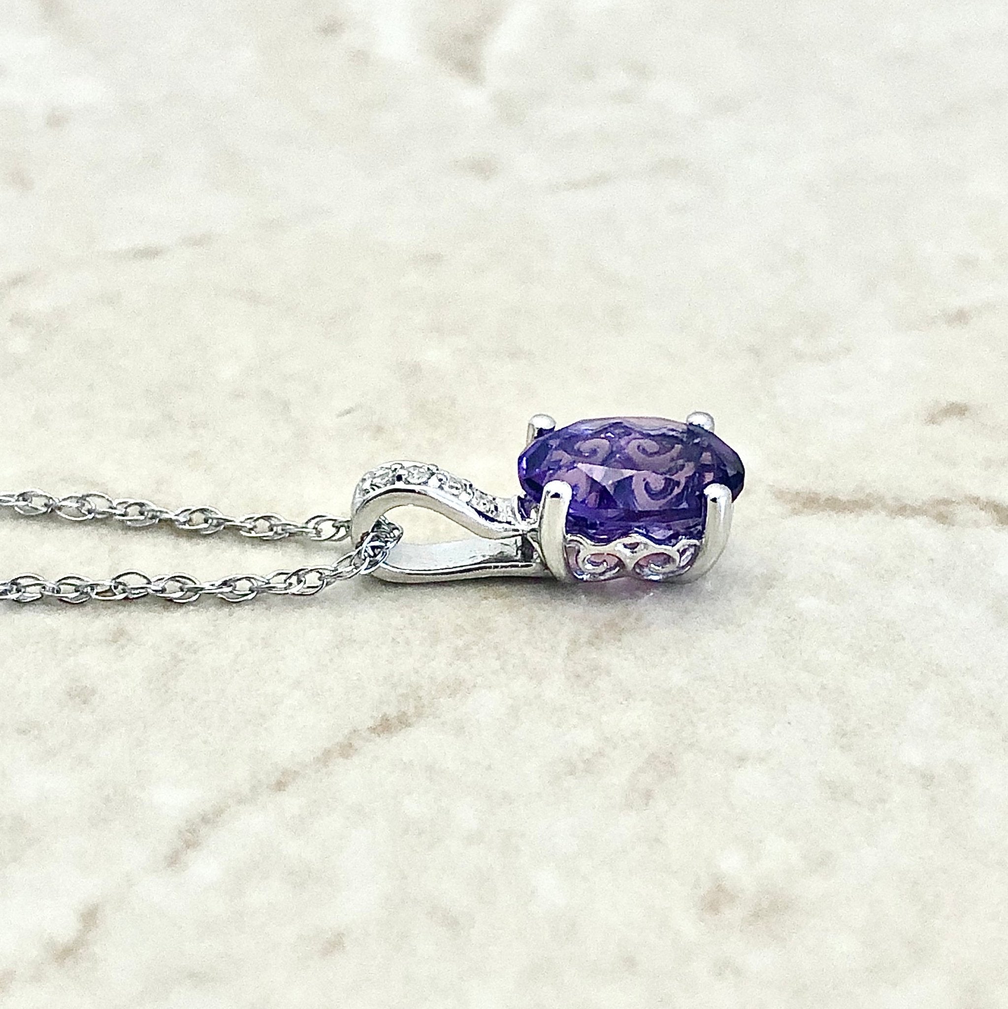 February Birthstone. NIB. Oval Cut Amathyst Pendant with outlet A Lovely Diamond Accent