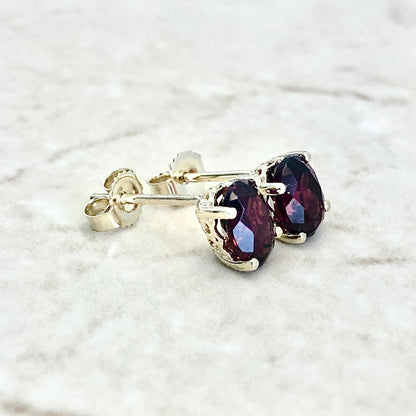 14 Karat Yellow Gold January Birthstone Oval Garnet Stud Earrings - WeilJewelry