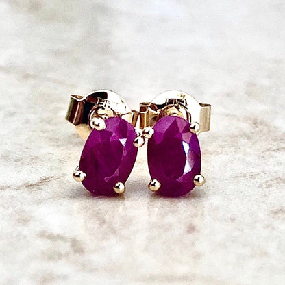 14 Karat Yellow Gold July Birthstone Oval Ruby Stud Earrings - WeilJewelry