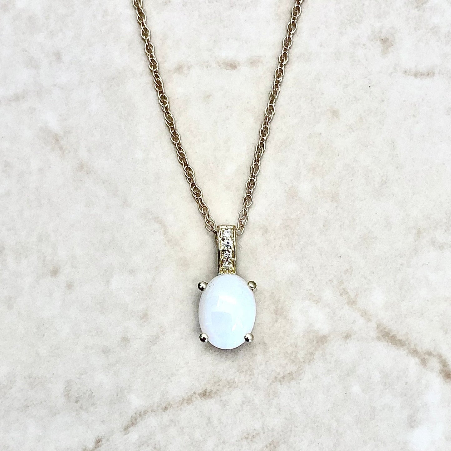 14 Karat Yellow Gold October Birthstone Oval Opal & Diamond Pendant Necklace - WeilJewelry