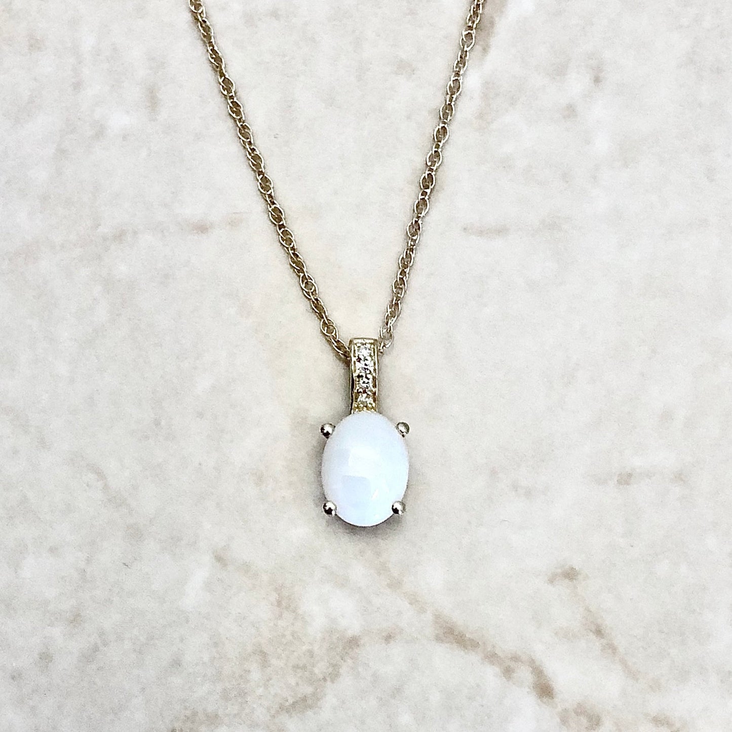 14 Karat Yellow Gold October Birthstone Oval Opal & Diamond Pendant Necklace - WeilJewelry