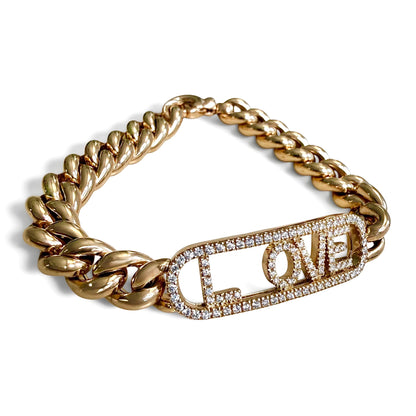 ZYDO rose gold LOVE bracelet with sliding letters grouped toward the right side of the diamond-set frame.