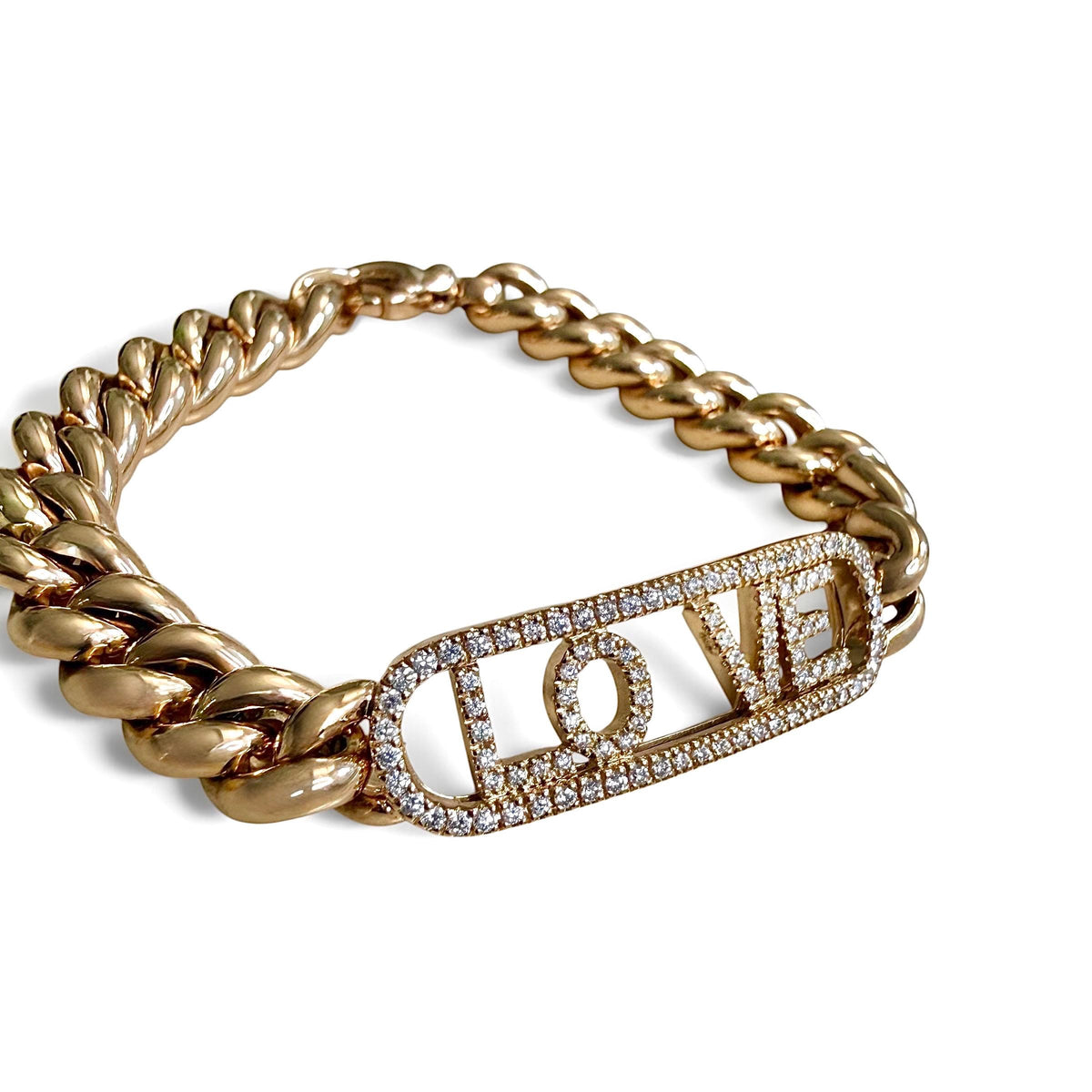 Close-up of the ZYDO Amore in Rosa bracelet showing spaced sliding LOVE letters, round diamonds and rounded rose gold links.