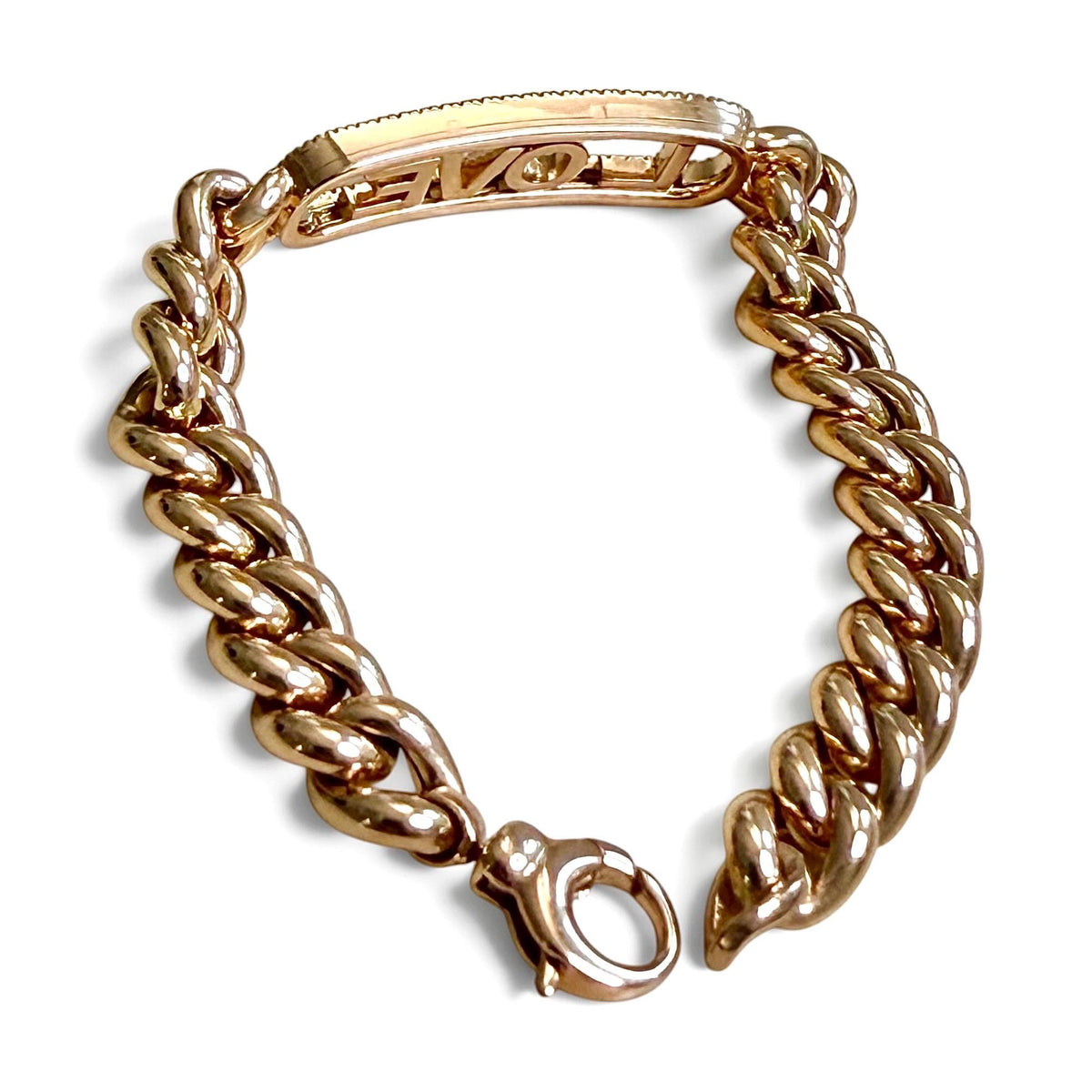 Reverse view of the ZYDO Amore in Rosa bracelet showing the backs of the sliding letters, open frame, curb links and lobster clasp.