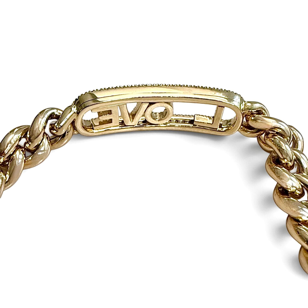 Reverse close-up of the ZYDO Amore Dorato bracelet, showing the polished yellow gold backs of the sliding LOVE letters and their open frame.