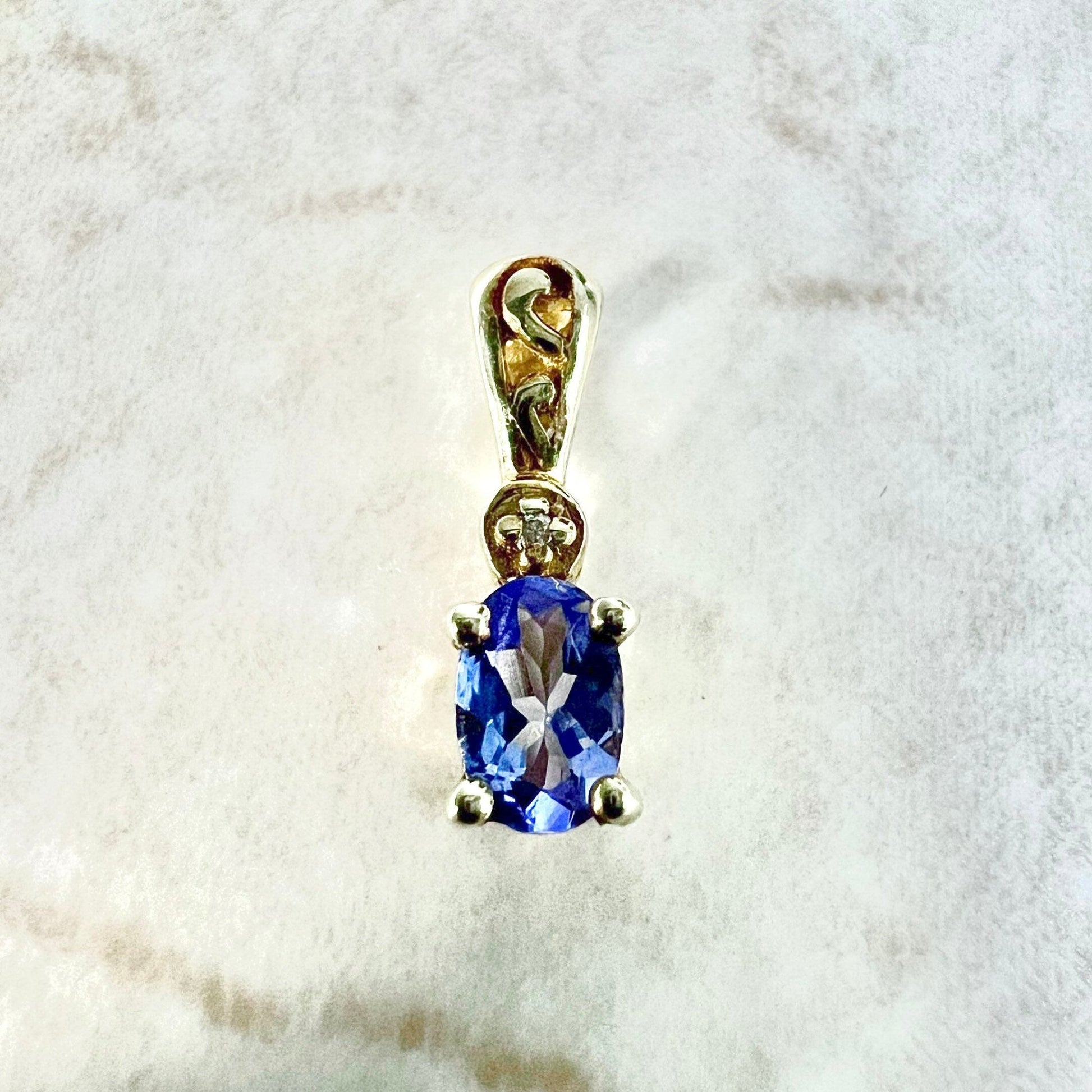 10 Karat Yellow Gold Oval Tanzanite & Diamond Solitaire Pendant - WeilJewelry