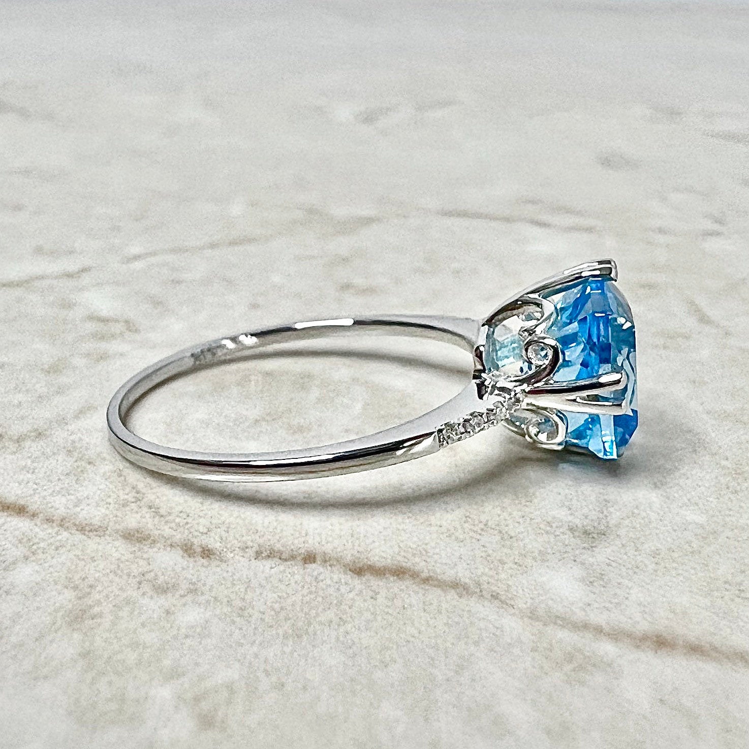 Swiss blue topaz hot sale price per carat