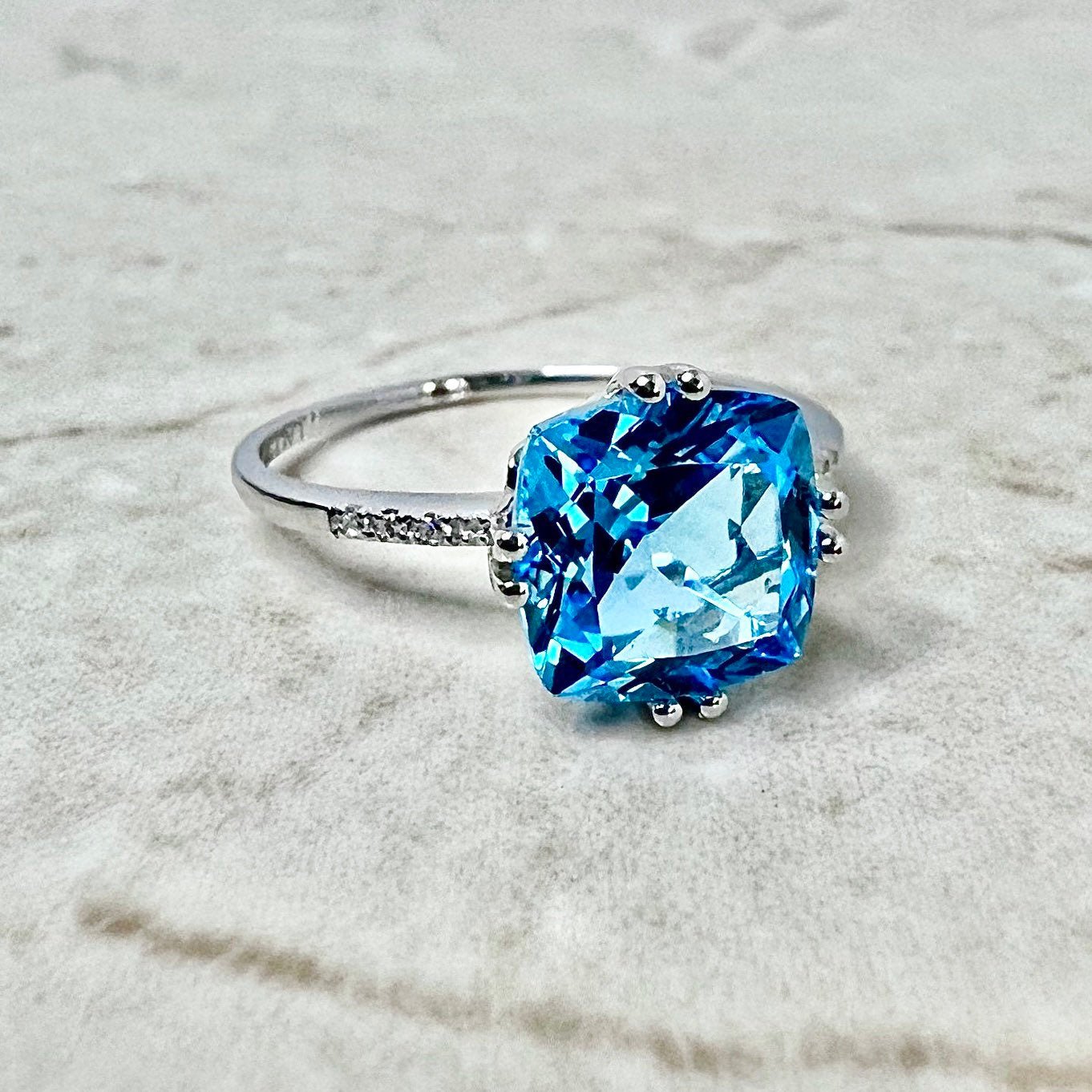 14k White Gold Genuine Swiss Blue Topaz Cushion Halo ring – Exeter Jewelers