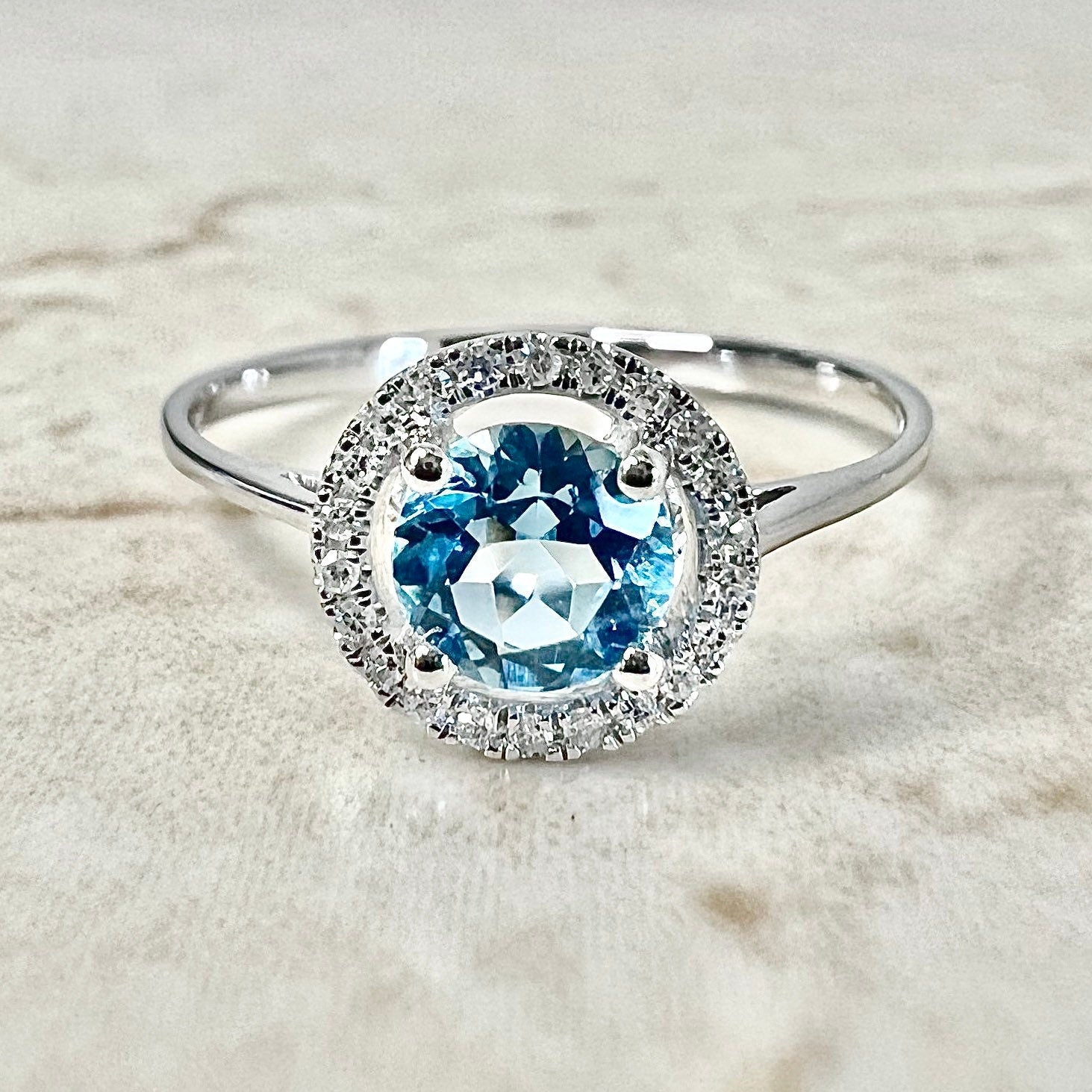 Blue topaz birthstone on sale rings