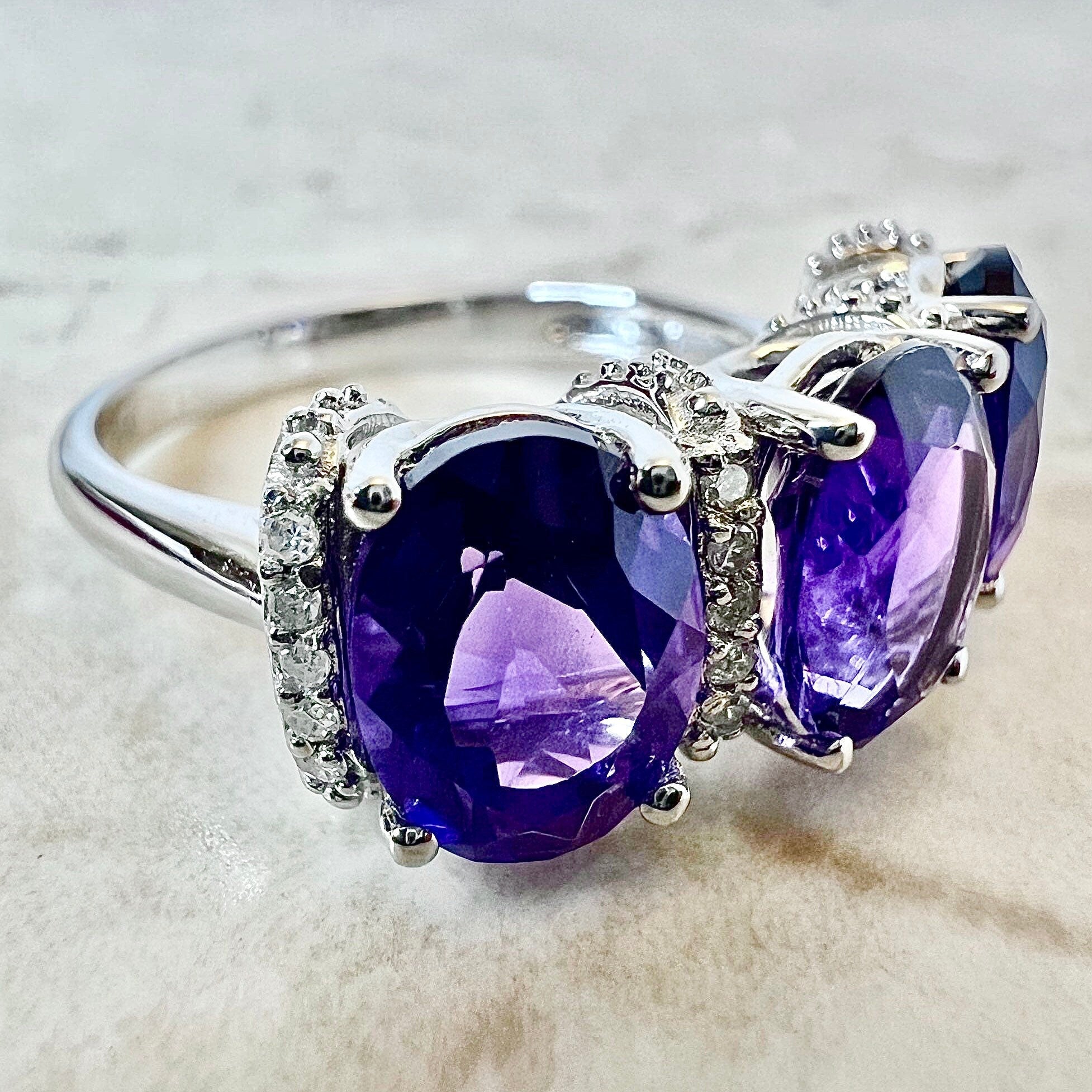 Three stone clearance amethyst ring