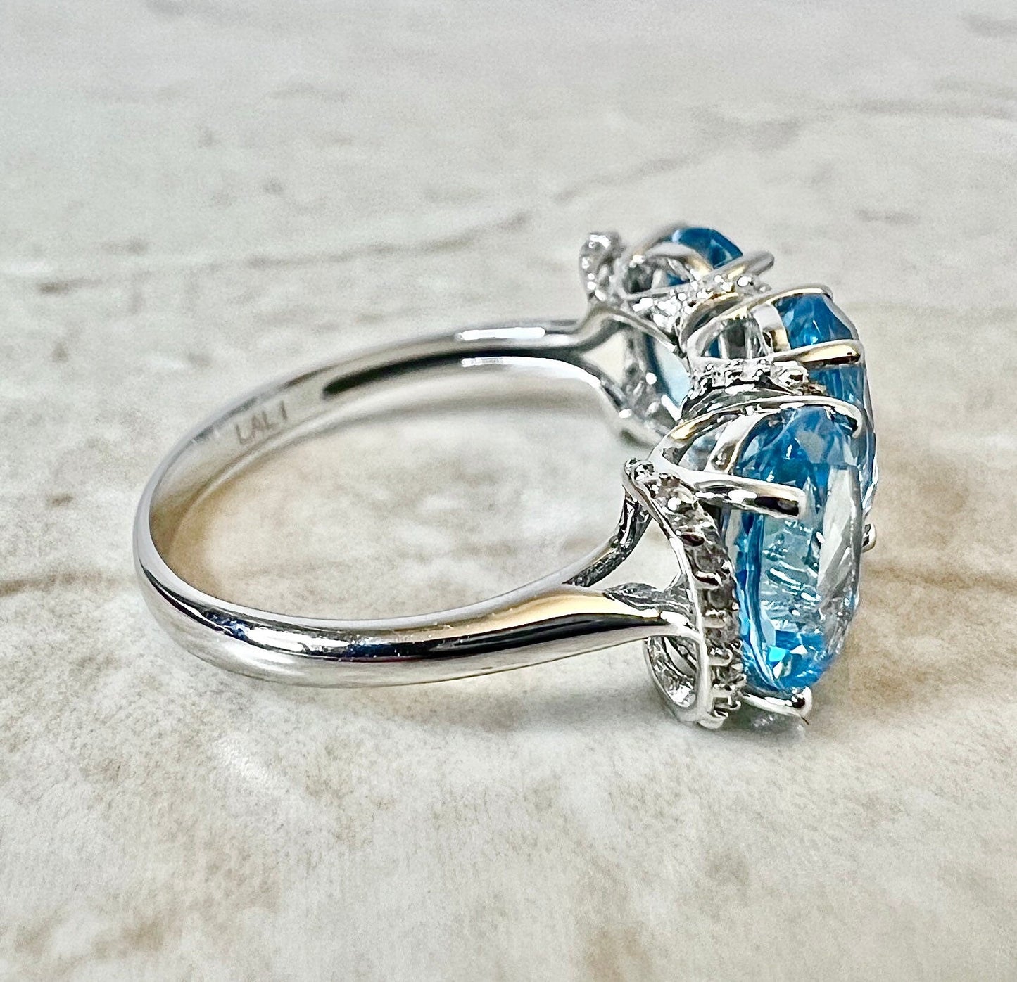 14 Karat White Gold Oval Swiss Blue Topaz & Diamond Three - Stone Ring - WeilJewelry