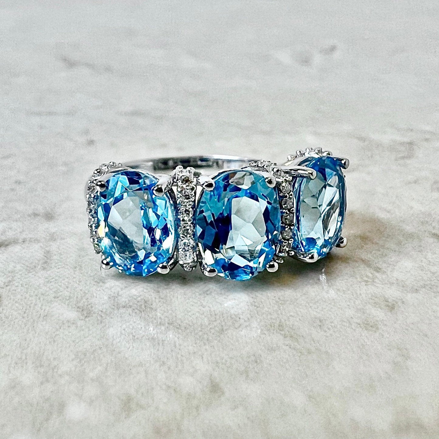 14 Karat White Gold Oval Swiss Blue Topaz & Diamond Three - Stone Ring - WeilJewelry