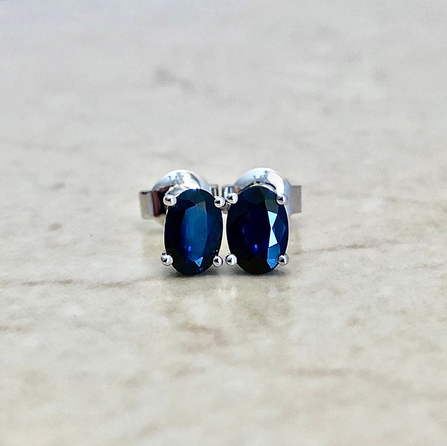 14 Karat White Gold September Birthstone Oval Blue Sapphire Stud Earrings - WeilJewelry