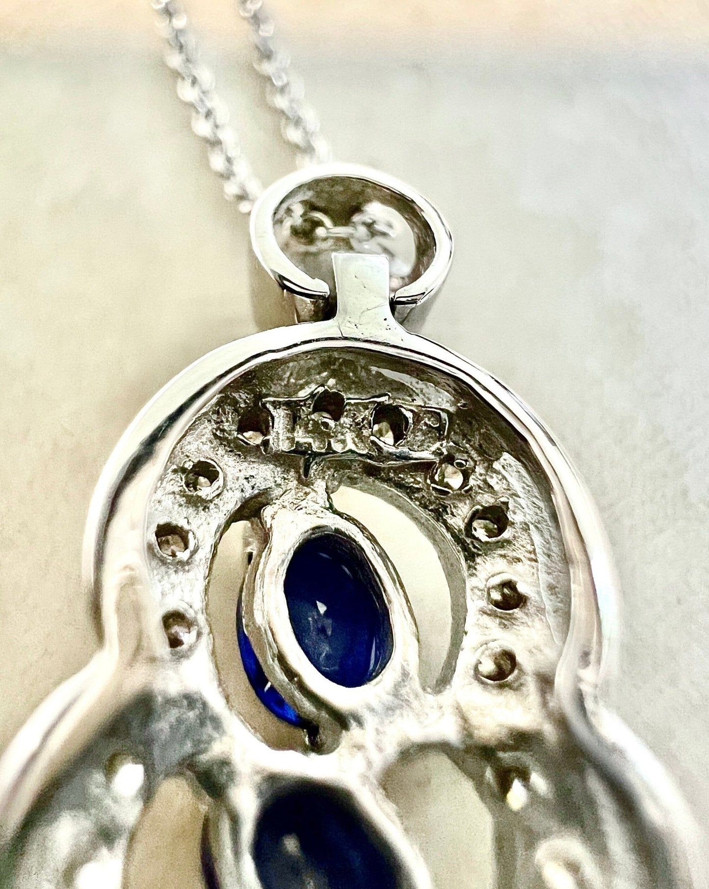 14 Karat White Gold Three - Stone Blue Sapphire & Diamond Halo Pendant Necklace - WeilJewelry
