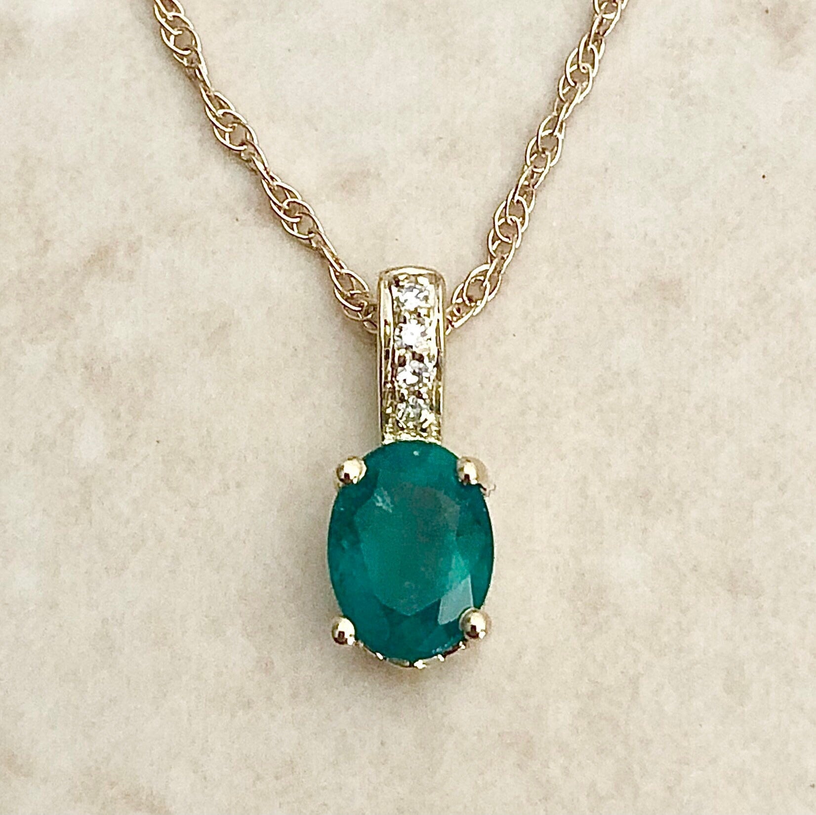14 Karat Yellow Gold May Birthstone Oval Emerald & Diamond Pendant Necklace - WeilJewelry