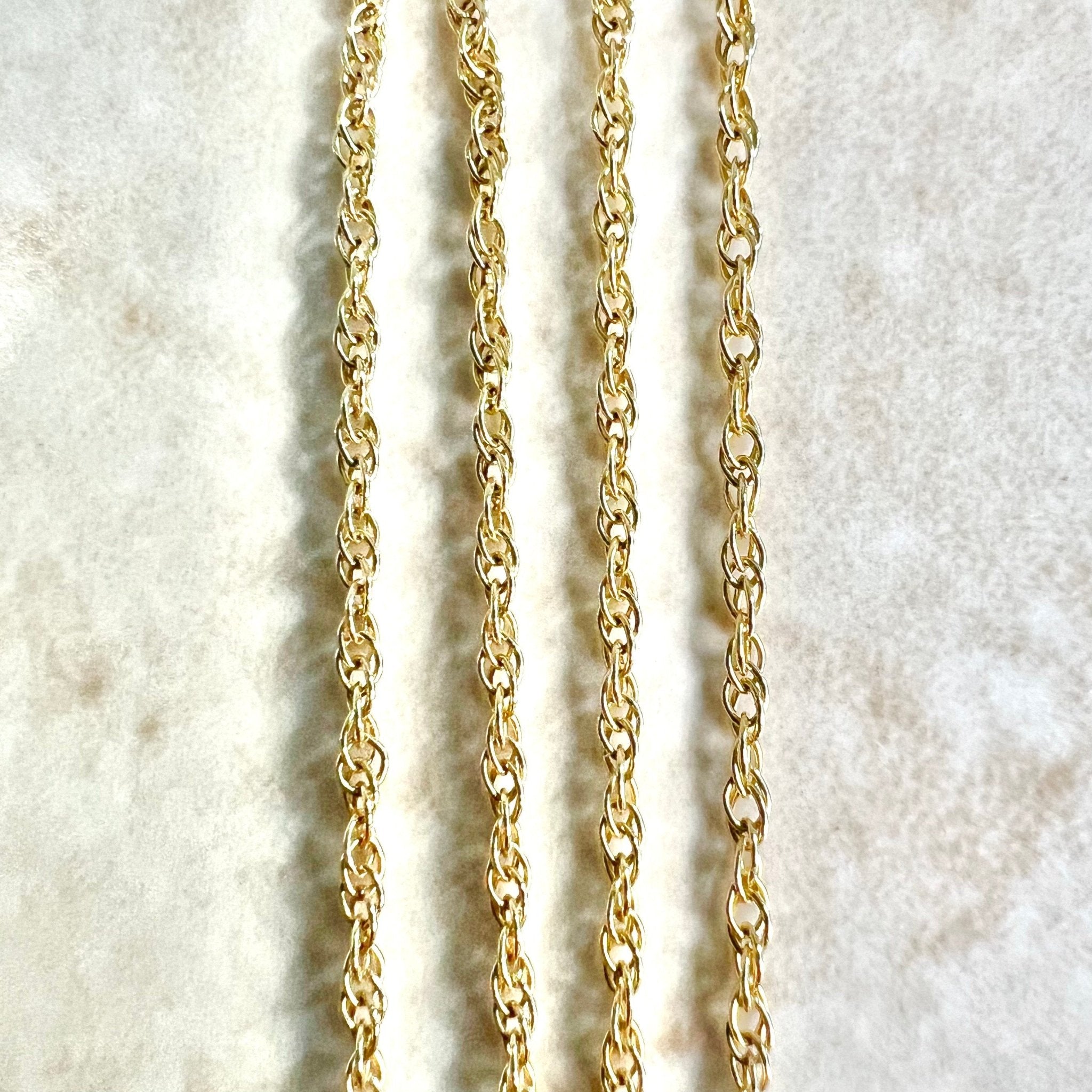 Yellow gold rope on sale necklace