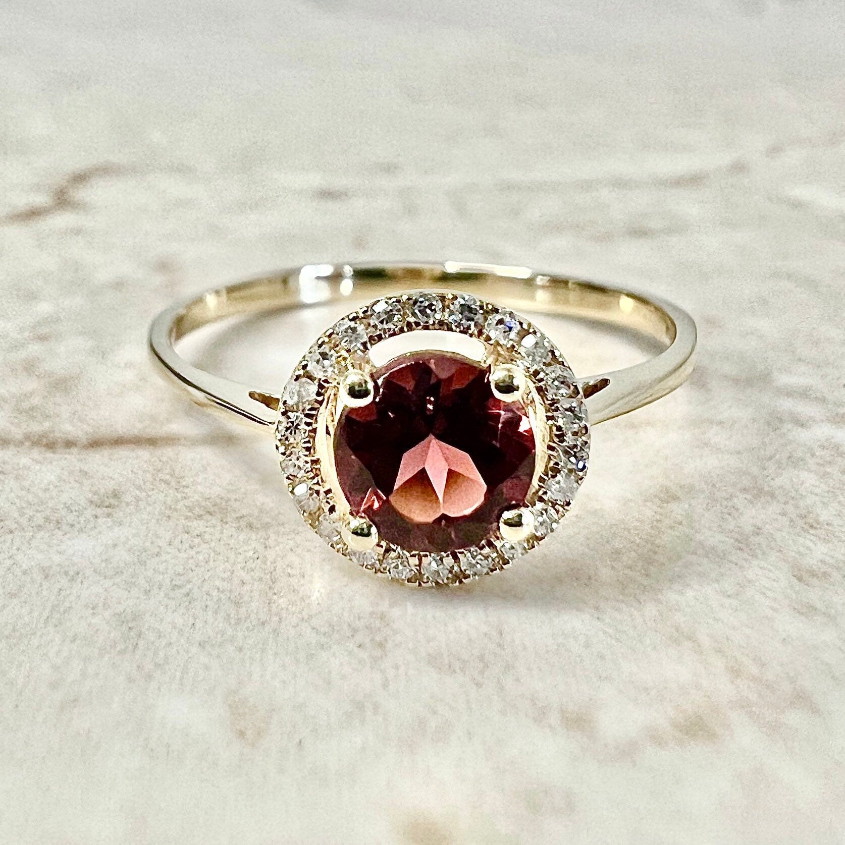 Garnet ring with diamond on sale halo