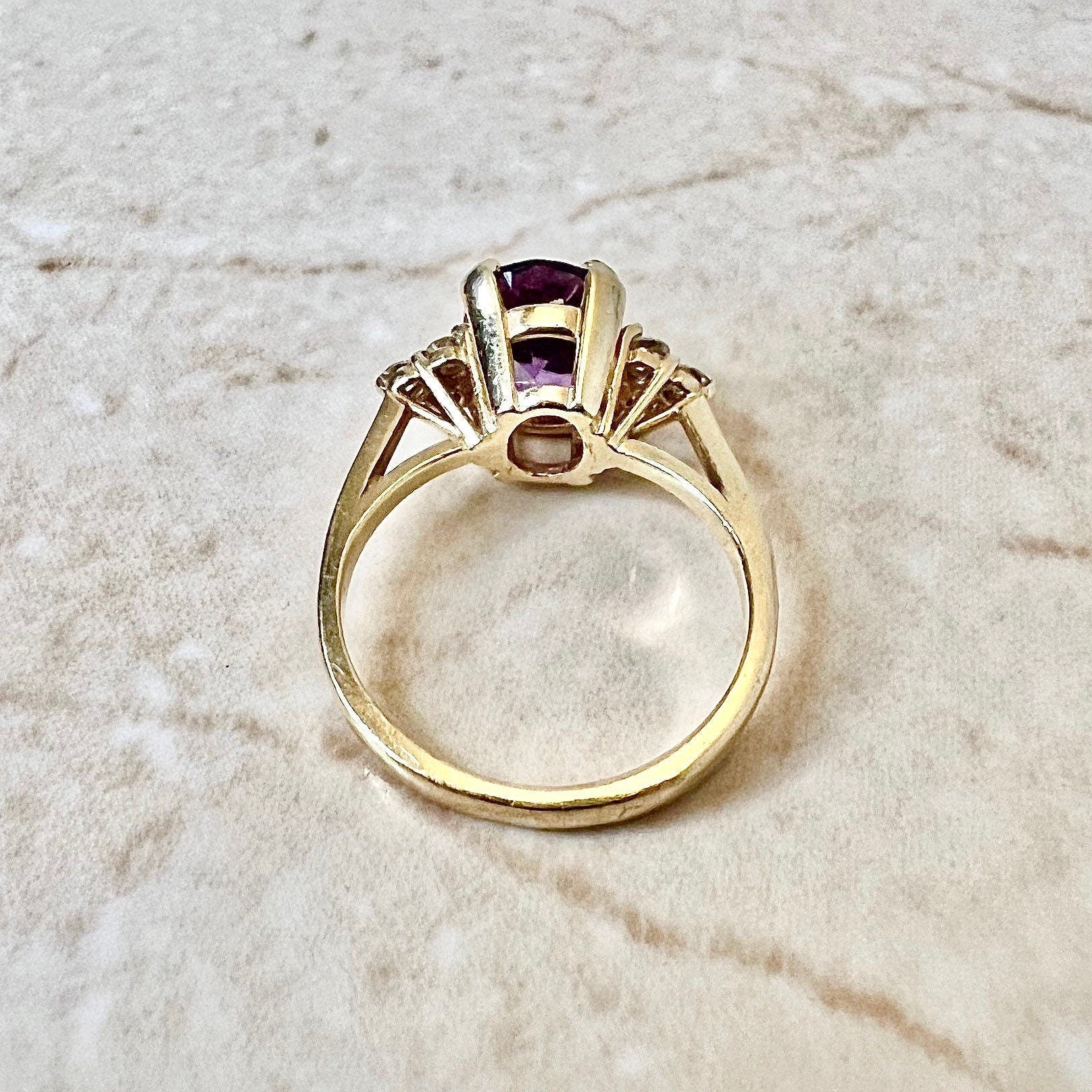 14 karat yellow gold oval amethyst diamond solitaire ring 288899