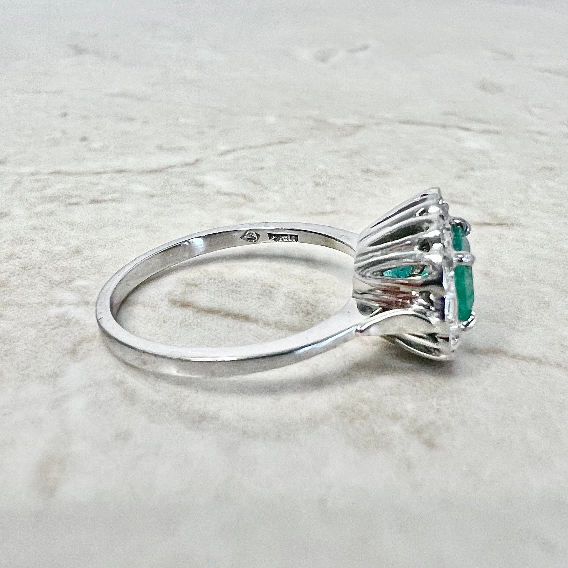 Vintage 18 Karat White Gold Natural Emerald Diamond Halo Ring